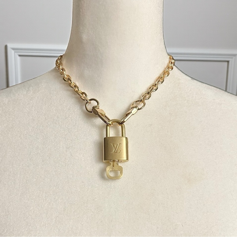 Authentic Louis Vuitton #300 Lock & Key Set on a 18K Gold Plated Chain Necklace